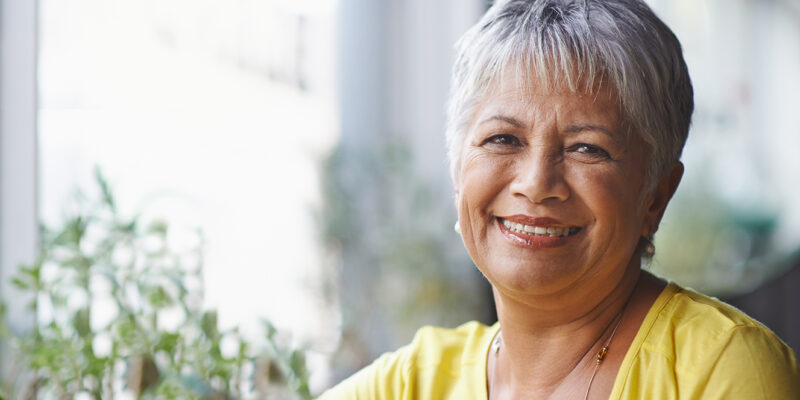 woman smiling At Peter Family and Cosmetic Dentistry, located in Independence, KY